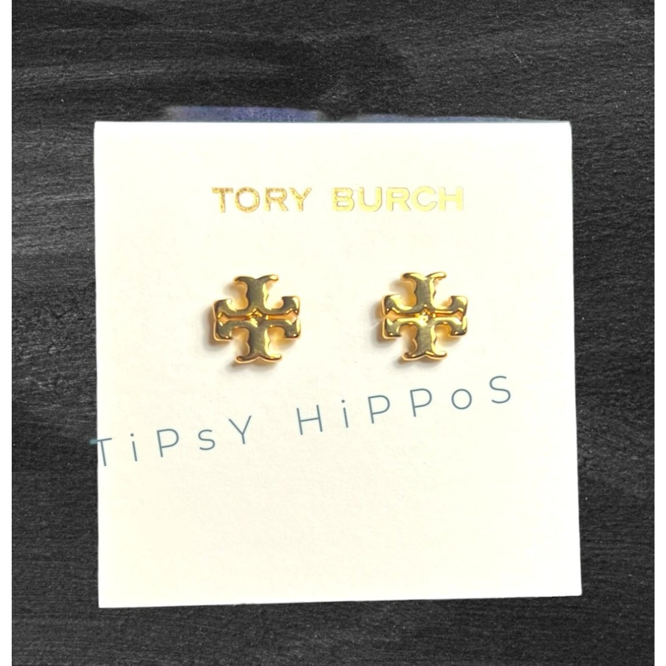 both. Tory Burch Gold Kira Logo Stud Earrings