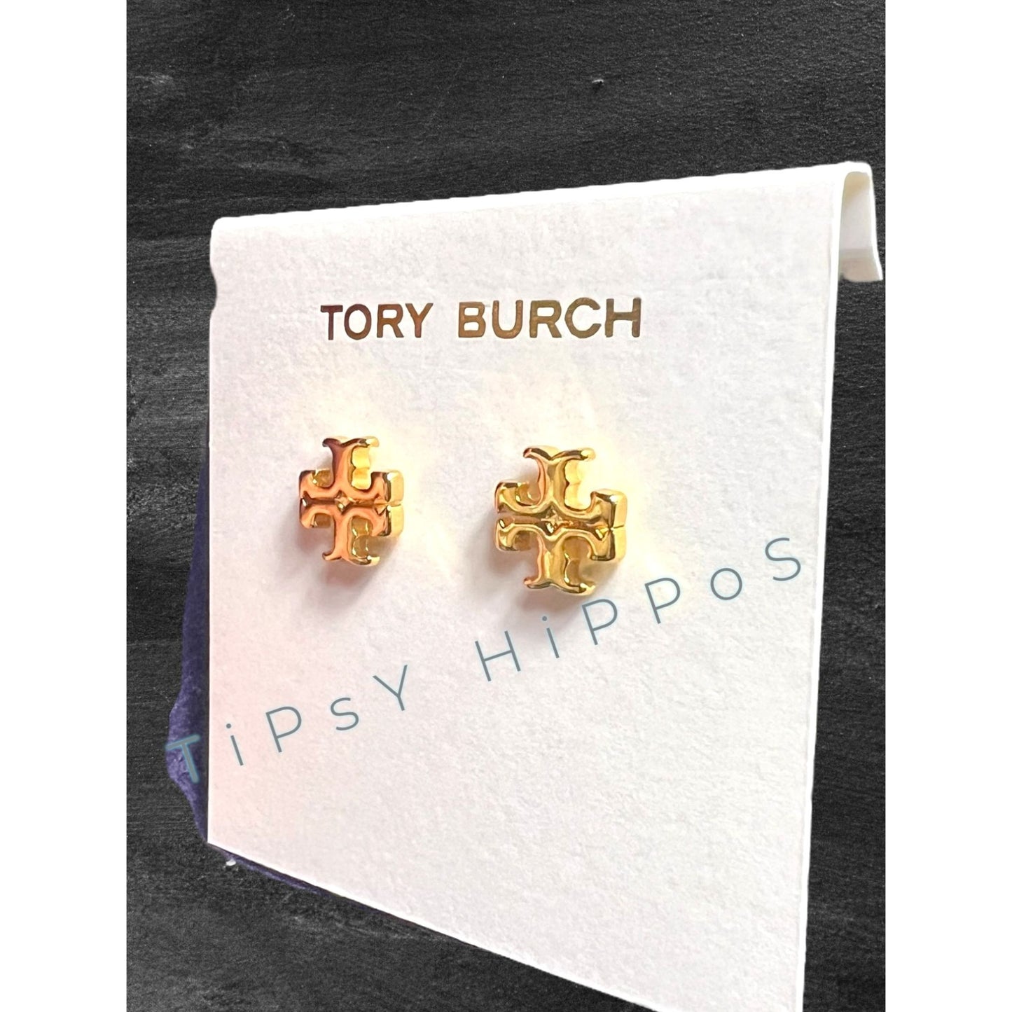 both. Tory Burch Gold Kira Logo Stud Earrings