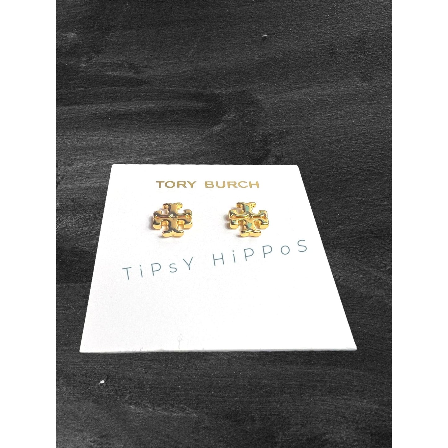 both. Tory Burch Gold Kira Logo Stud Earrings